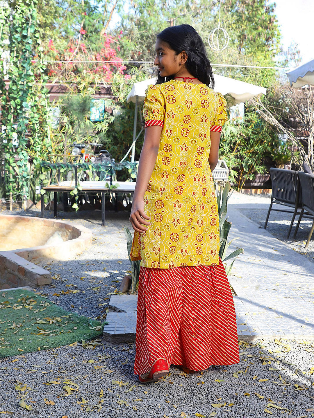 Yellow bandhani Kurta with red leheriya sharara